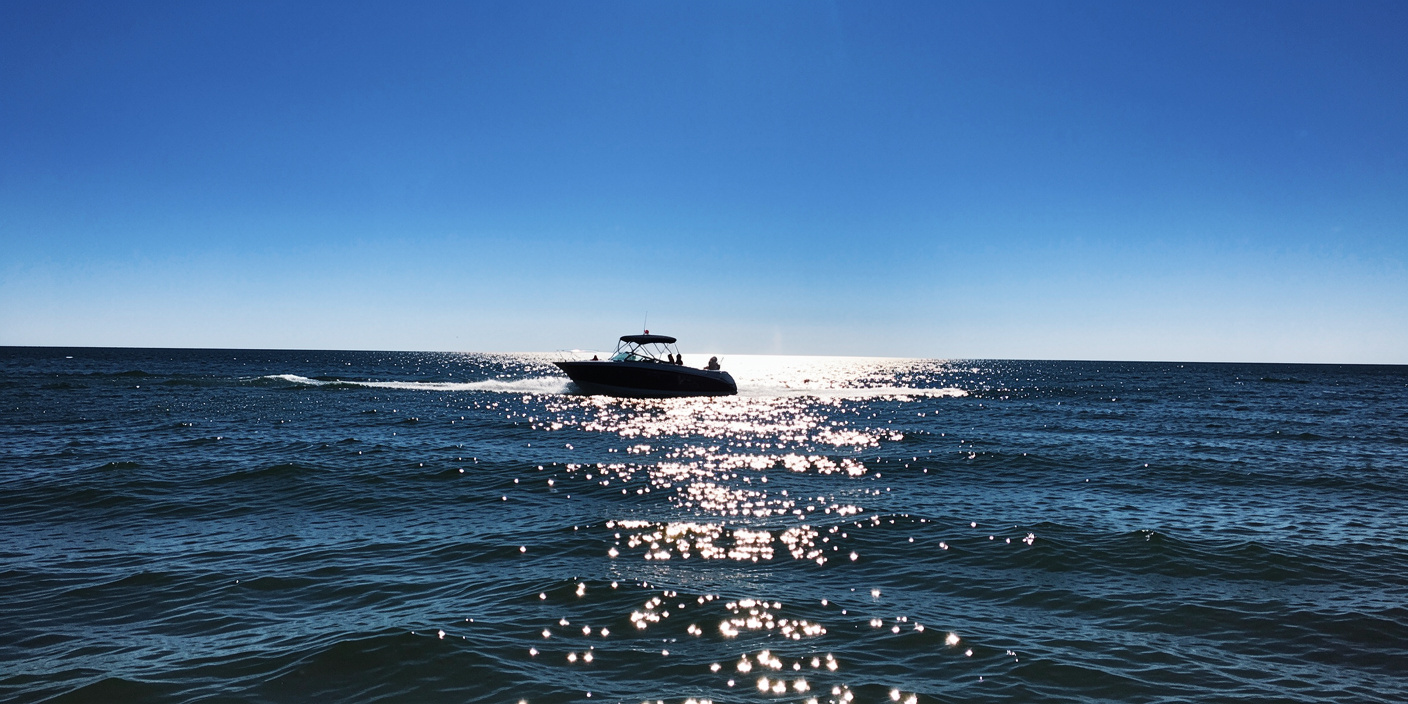 Speedboat navigating open water on a large Ukrainian lake or reservoir